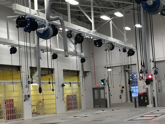 Garage-autobus-devidoirs-ressort-air-comprime