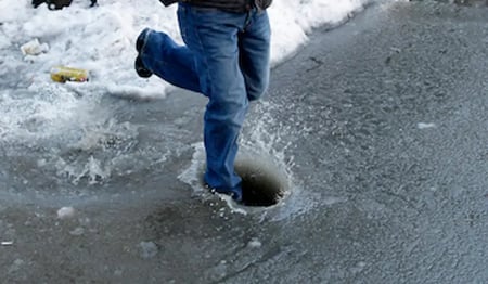 Sidewalk-Street-Slush-Winter-Thaw-Freeze-Pedestrian-Safety